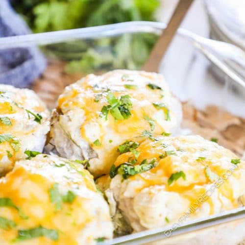 Pork Chops smothered in Green Chiles and cheese cooked in a baking dish