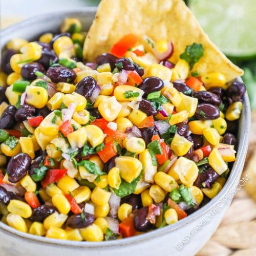 Close up of a bowl of corn and black bean salsa