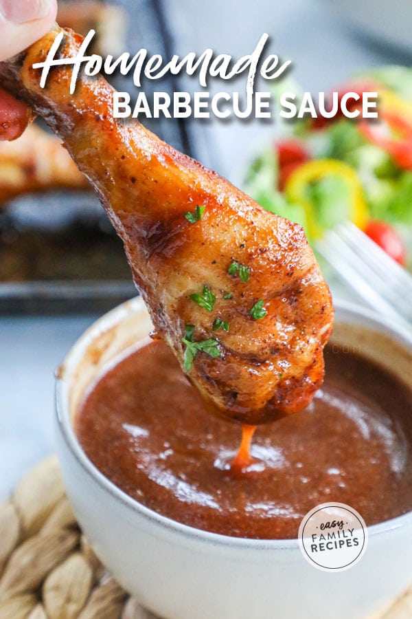 Dipping chicken in easy homemade bbq sauce