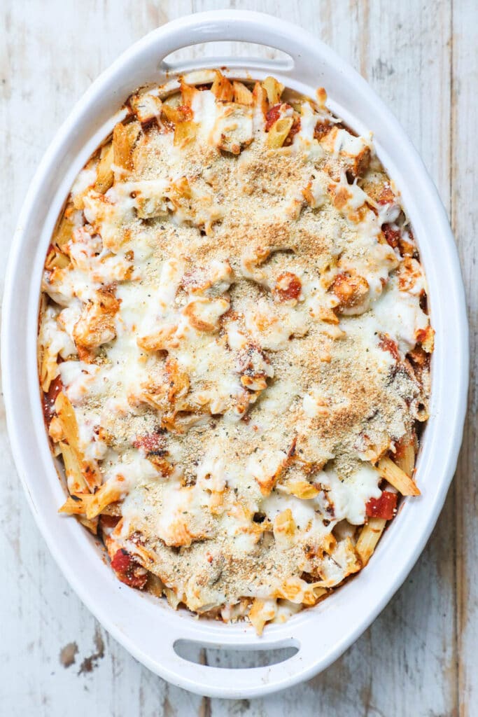How to make chicken parmesan casserole recipe step 4: Bake the casserole until cooked through and then garnish with basil.