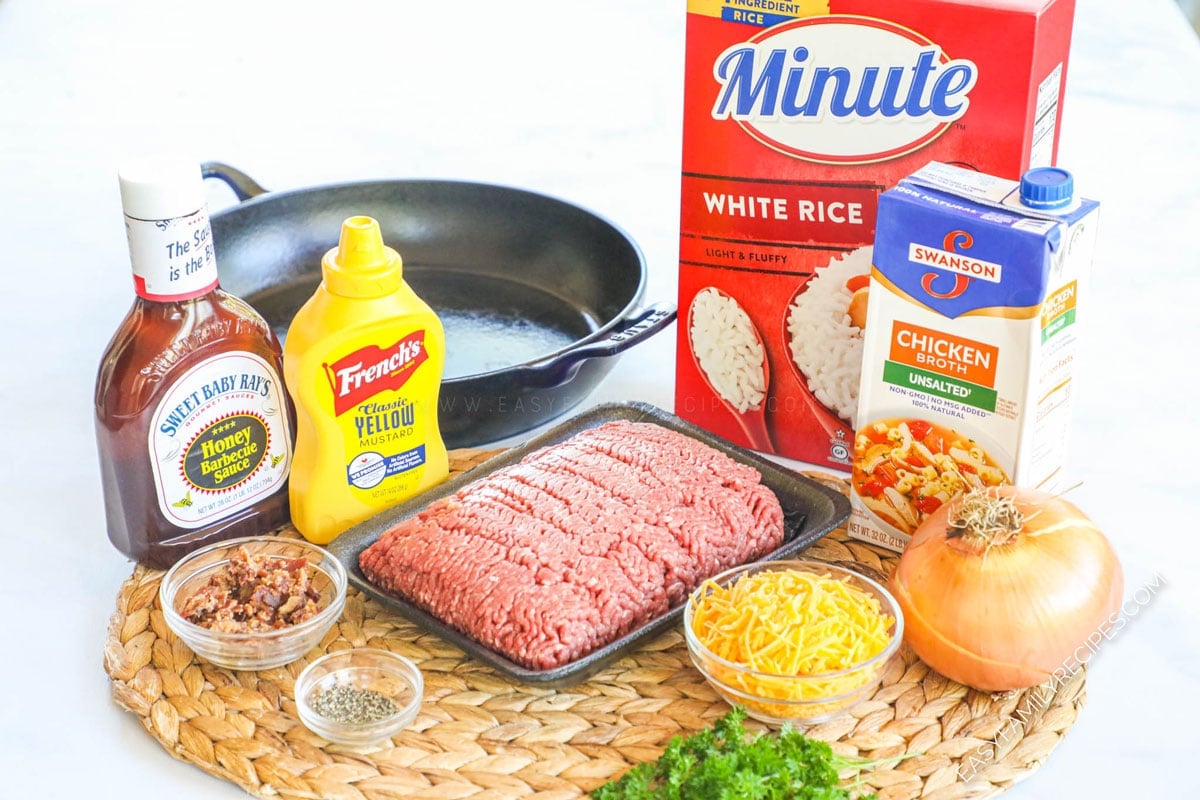 Ingredients for making Bacon Cheeseburger Rice - ground beef, onion, bbq sauce, broth, and cheese