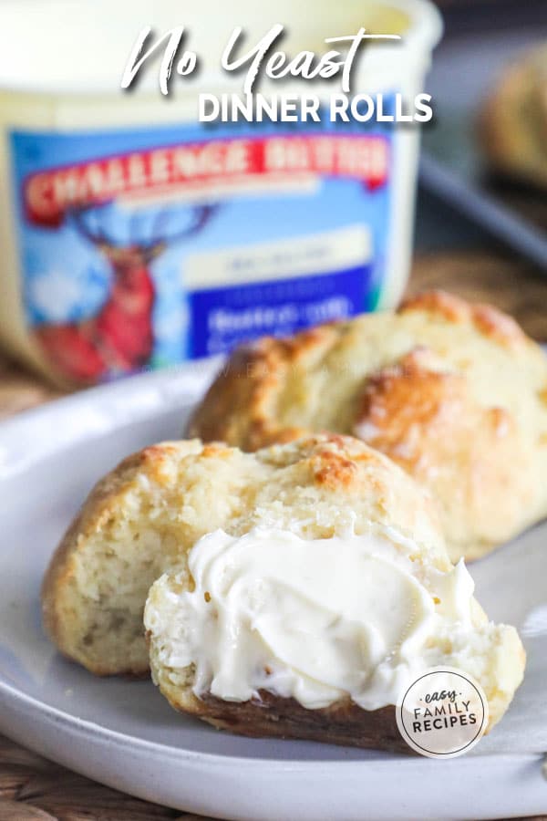 Close up of a No Yeast Dinner Rolls slathered with butter