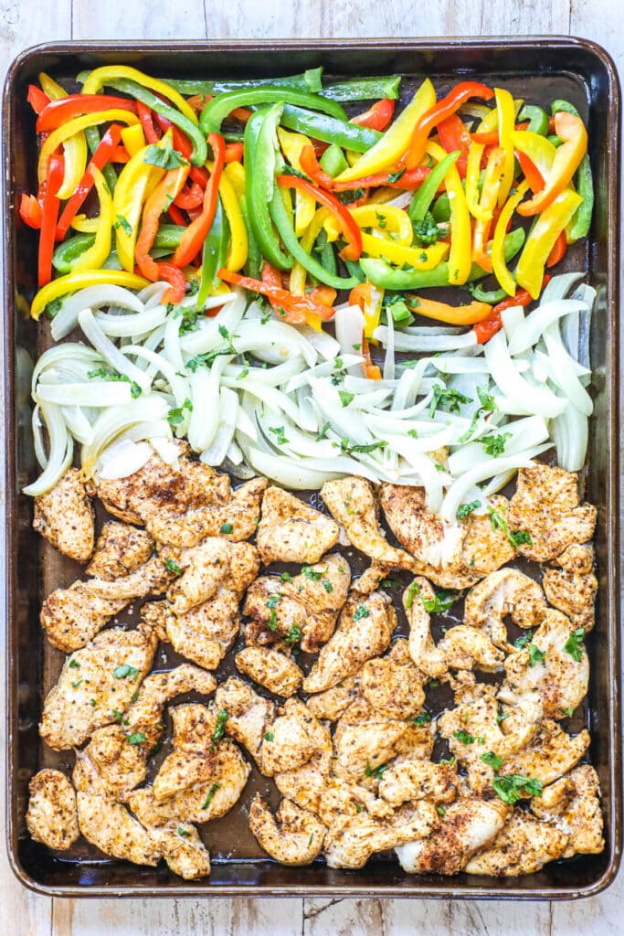 How to make sheet pan chicken fajitas step 4: bake sheet pan chicken fajitas at high heat until the chicken is cooked through and the veggies are tender.