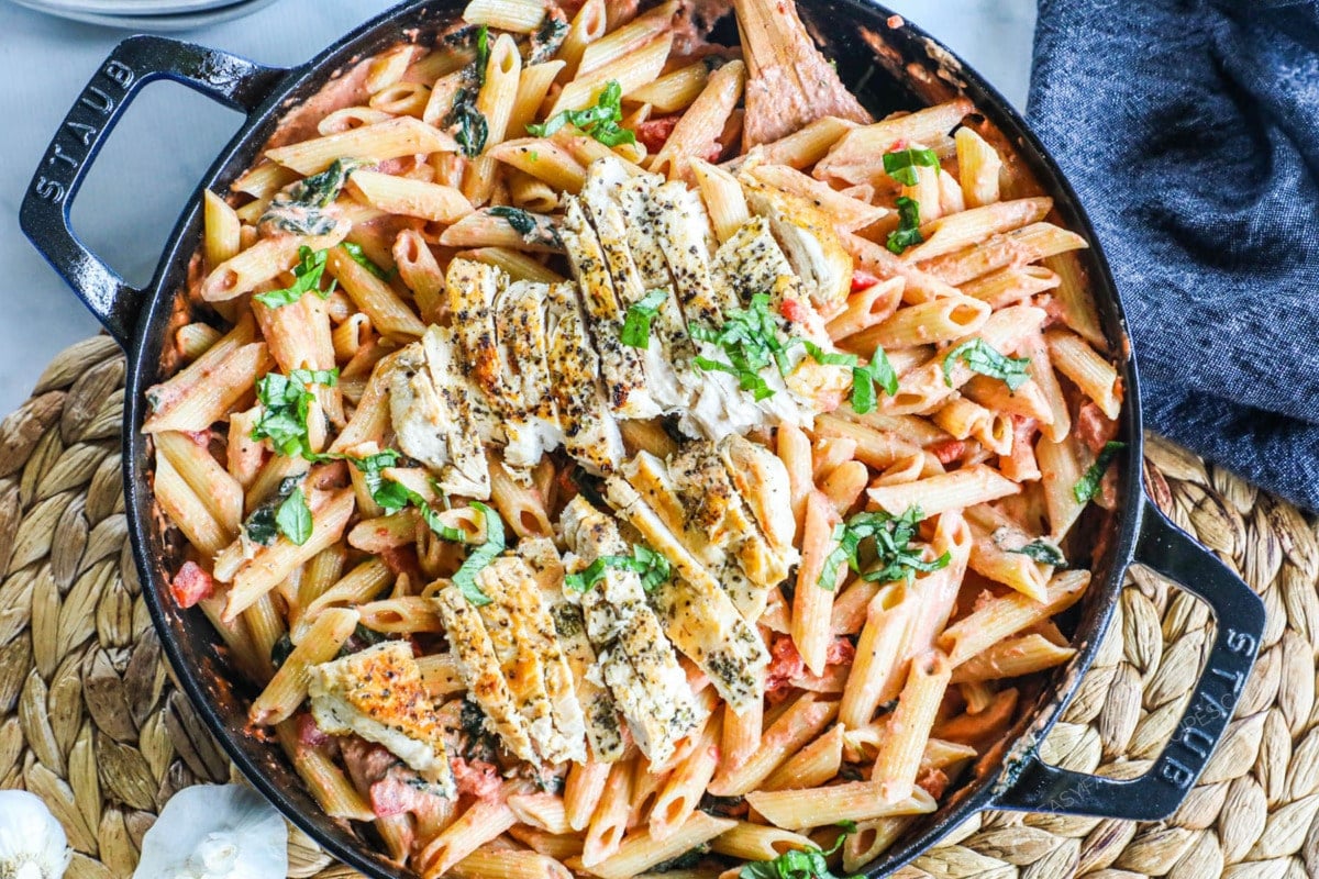 Creamy Italian Pasta with Chicken recipe prepared and ready to serve sitting on the dinner table.