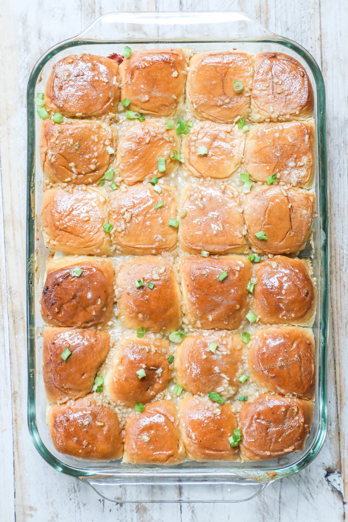 Process photos for how to make baked Roast Beef Sliders 4. Bake for 20 minutes or until the sandwiches are heated through and the cheese is melted.