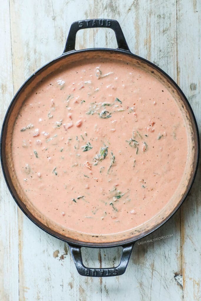 How to make Creamy Italian Chicken Pasta Step 2: stir in cream until it is fully incorporated.