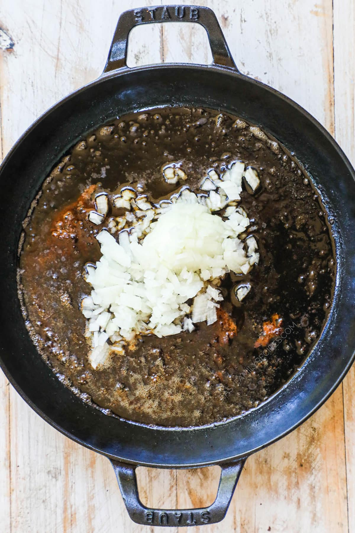 step 3 - Add onions to pan drippings