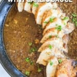 pork tenderloin in a skillet with gravy