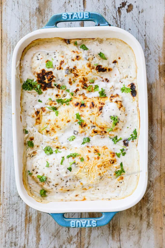 How to make cream of mushroom chicken casserole step 4: Bake the casserole until chicken is cooked through and edges are bubbly.