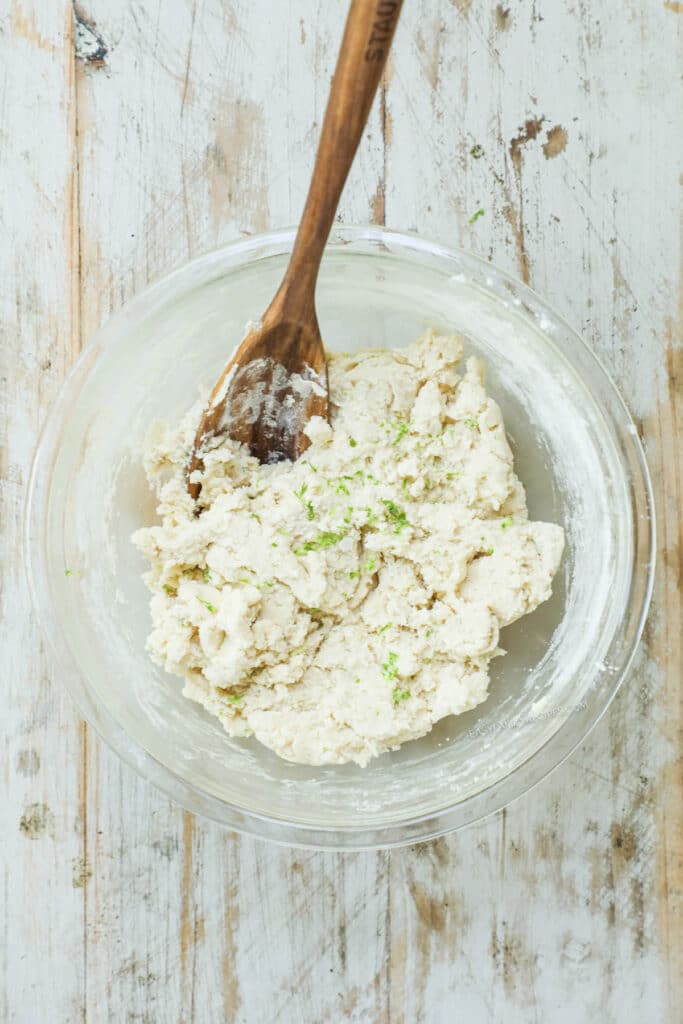How to make key lime cookies step 1: Combine dry and wet ingredients to make the cookie dough.
