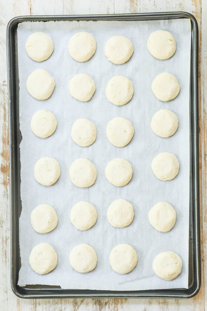 How to make key lime cookies step 2: Scoop the dough in tablespoonfuls onto a parchment lined baking sheet. Bake until the center is just set.