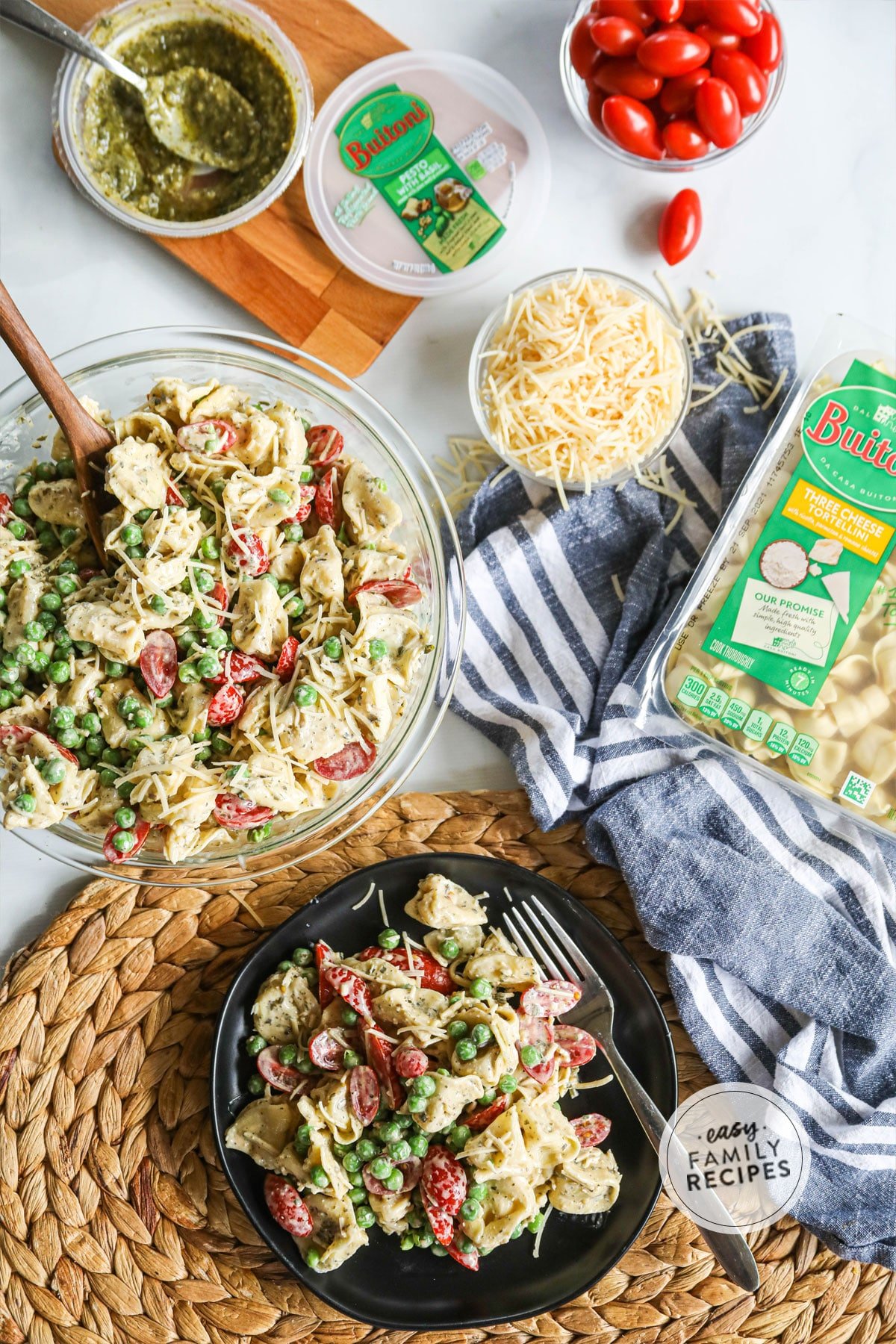 Table setting with pesto tortellini salad served on a plate