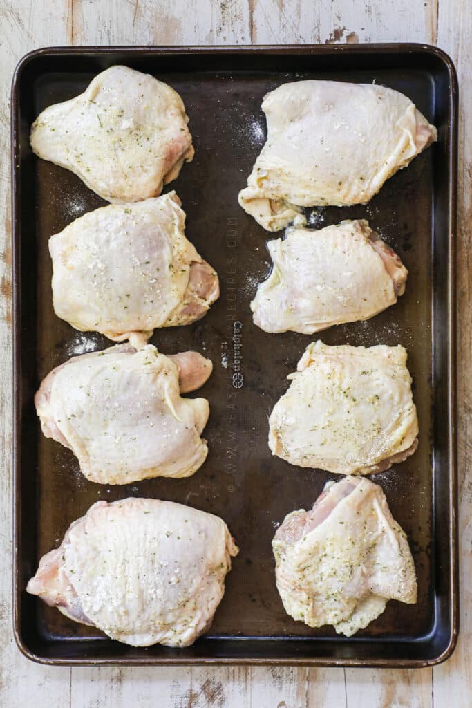 How to make ranch baked chicken thighs step 3: Lay the chicken thighs on a baking sheet.