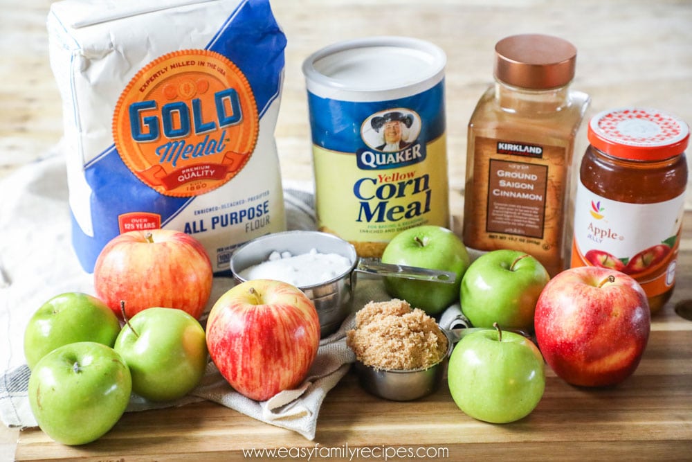 Ingredients to make homemade apple pie with cornmeal crust