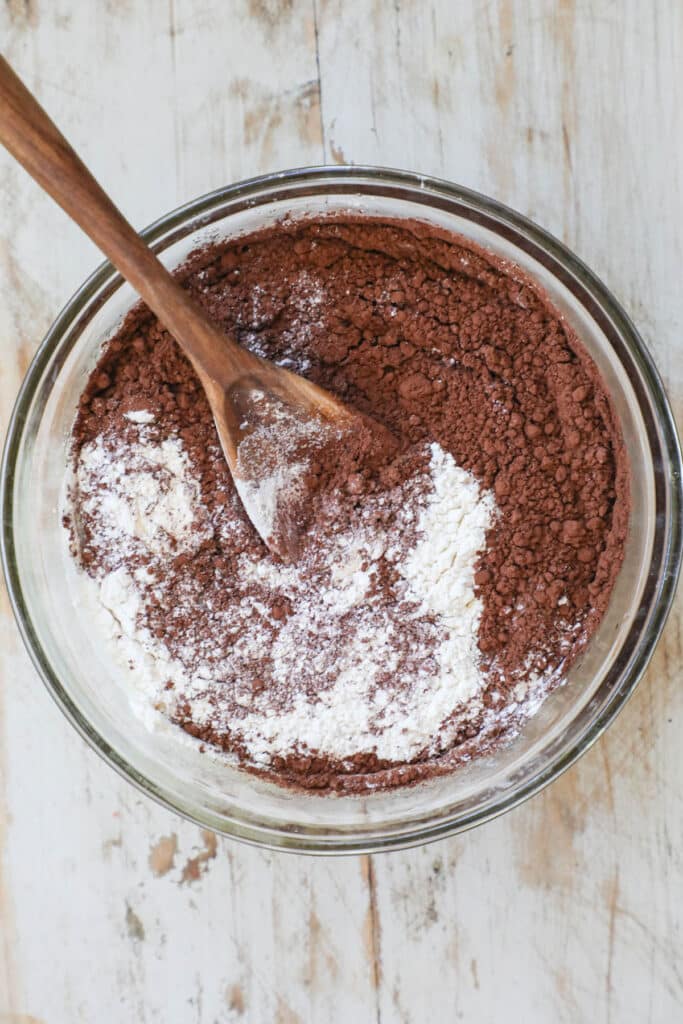Step by step for making fudge brownies from scratch: 1. Mix up brownie batter.