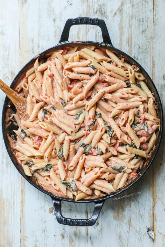 How to make Tomato Basil Pasta Step 4: Toss pasta with sauce to coat and garnish with basil.