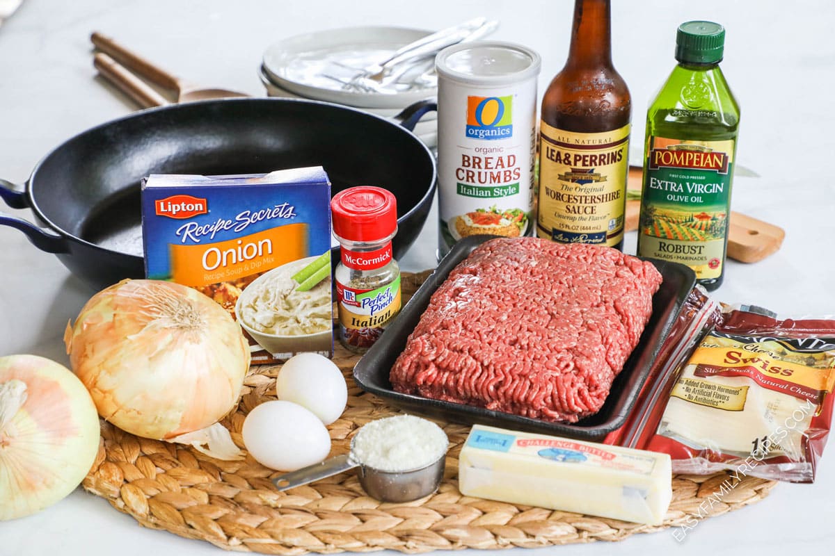 Ingredients for French Onion Meatballs including ground beef, onion, eggs, breadcrumbs, olive oil, butter and cheese