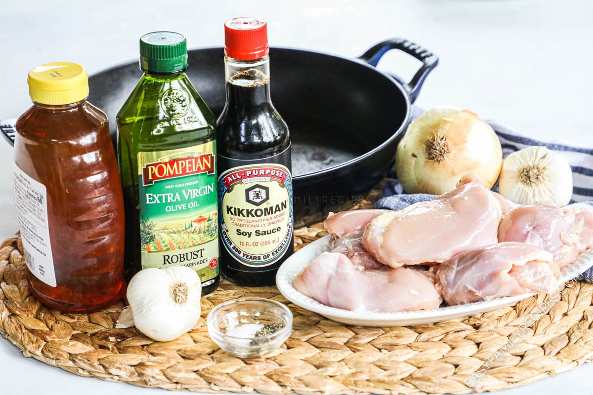 Ingredients for honey garlic chicken thighs including boneless chicken thighs, soy sauce, garlic, honey, seasonings