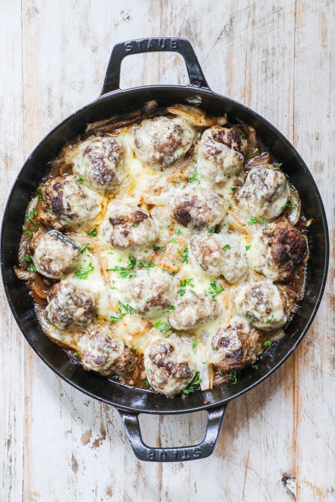 Add meatballs back into skillet and cover with cheese.