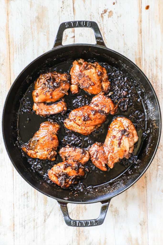 How to make honey garlic chicken step 6: Turn chicken thighs so they are evenly coated with sticky honey garlic sauce on all sides.