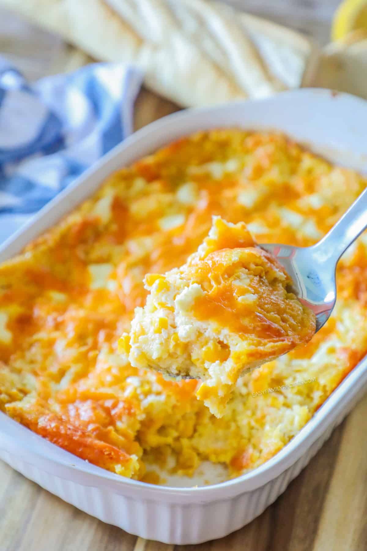 Best Jiffy corn casserole being scooped out of the casserole dish.