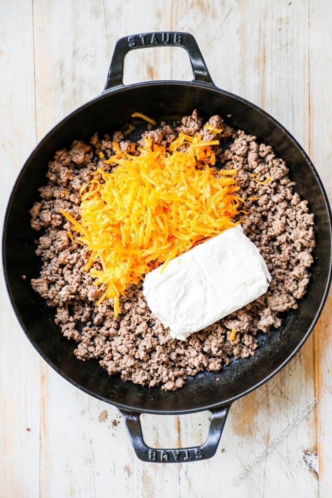 How to make cheeseburger pasta step 2: add cream cheese and cheddar cheese to ground beef