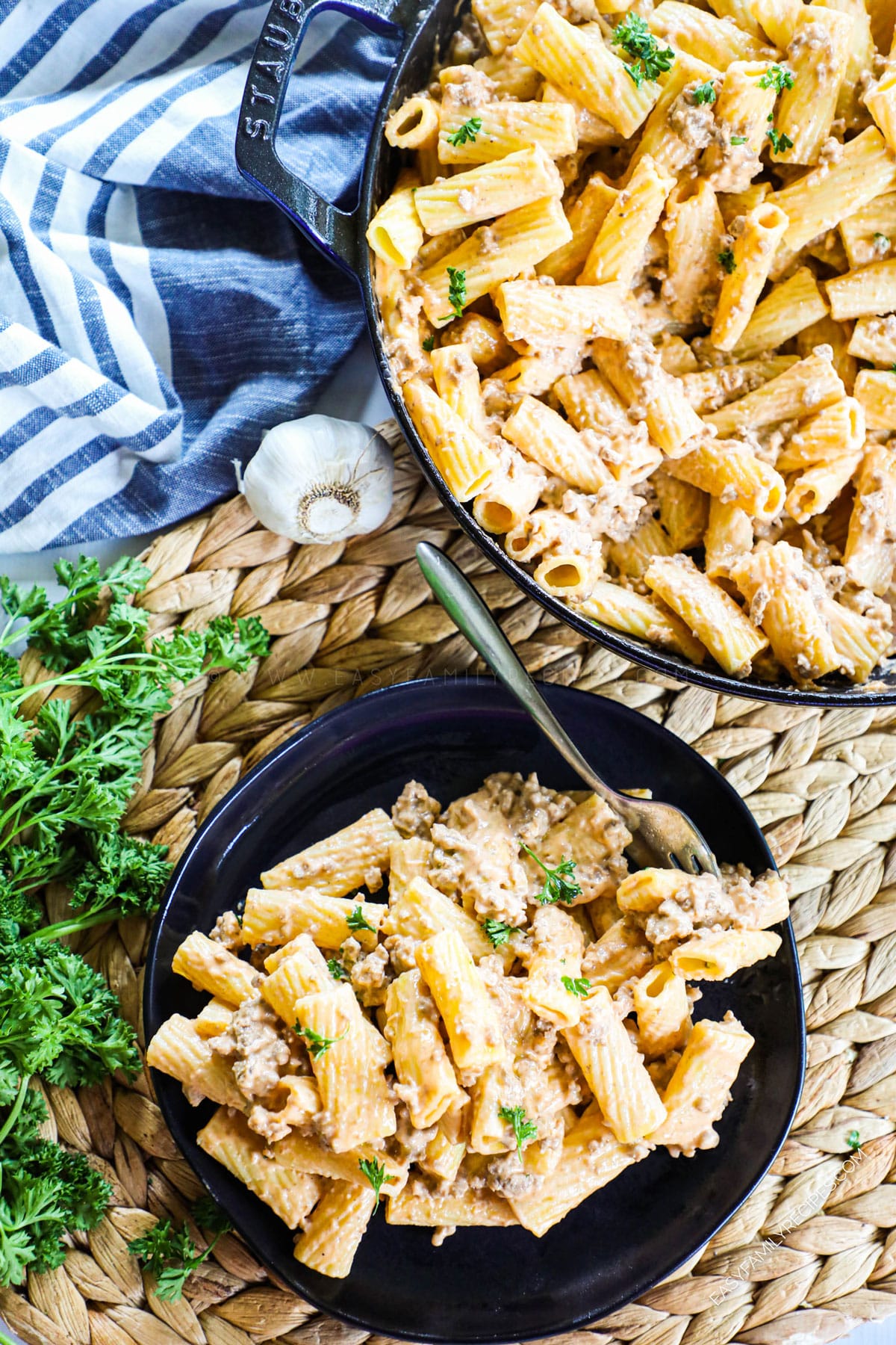 Cheeseburger Pasta Served on a plate next to skillet