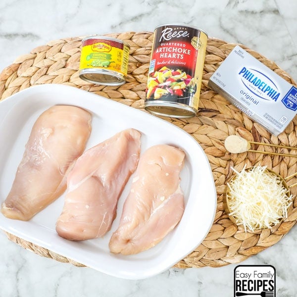 Ingredients for Creamy Artichoke Chicken Bake - Chicken Breast, green chiles, artichoke hearts, cream cheese, parmesan cheese, garlic