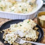 Creamy Artichoke Chicken Bake served over rice