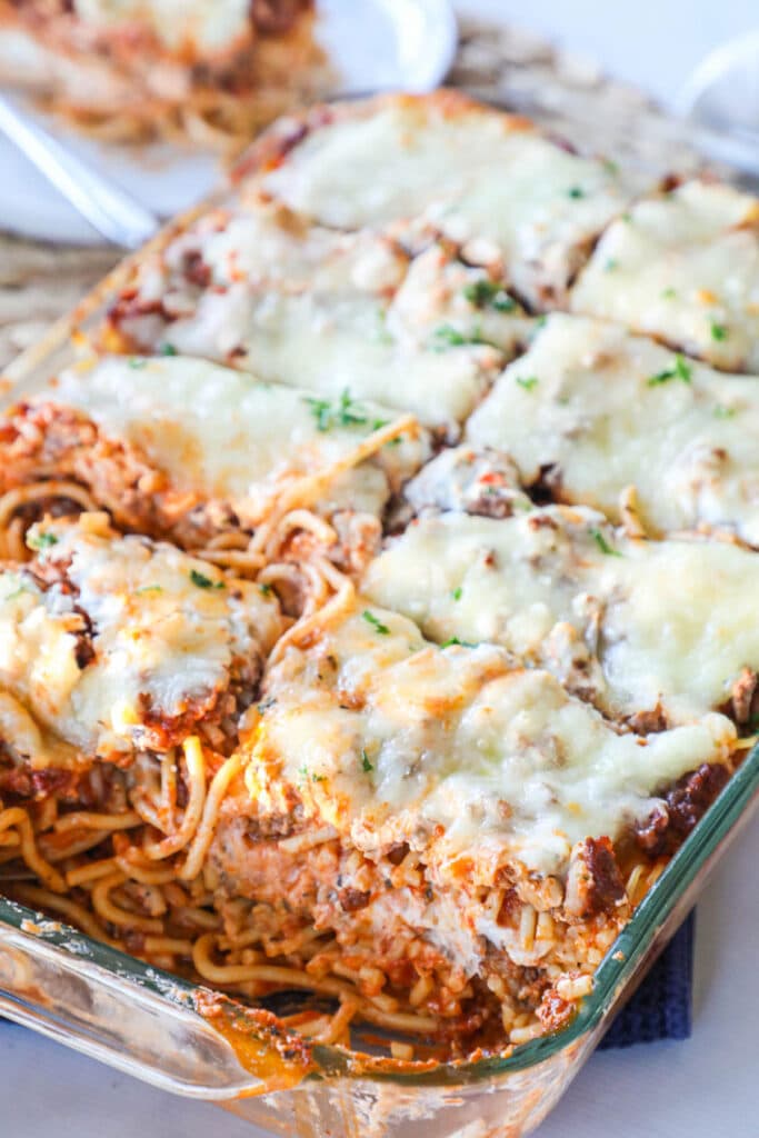 How to make million dollar spaghetti Step 4. Bake in a casserole dish until edges bubble.