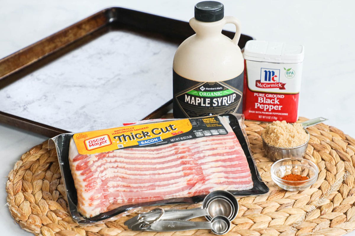 Ingredients for making Million Dollar Bacon- thick cut bacon, brown sugar, cayene pepper, black pepper, maple syrup