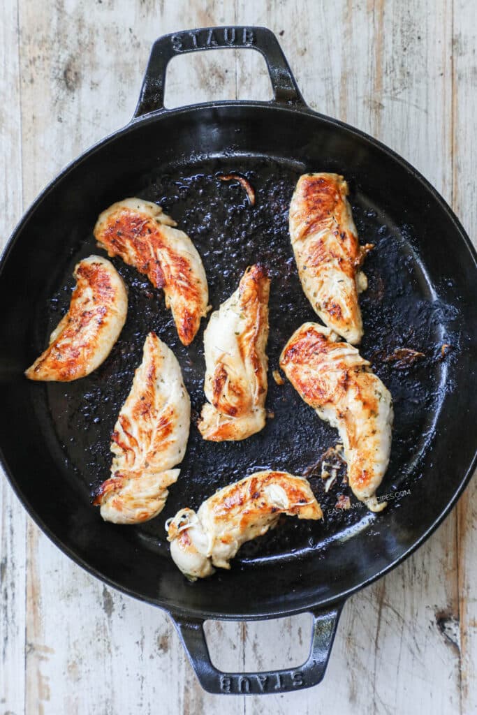 How to make Buffalo Chicken Tenders with no breading step 3: brown chicken tenderloins on both sides.