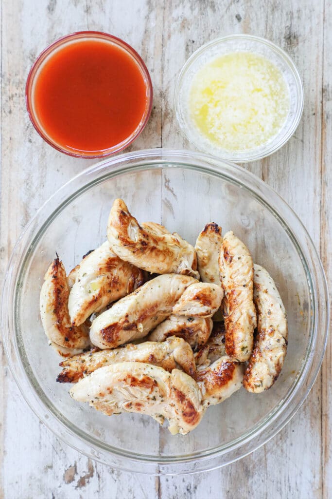 How to make Buffalo Chicken Tenders with no breading step 4: make buffalo sauce by combining hot sauce with butter.