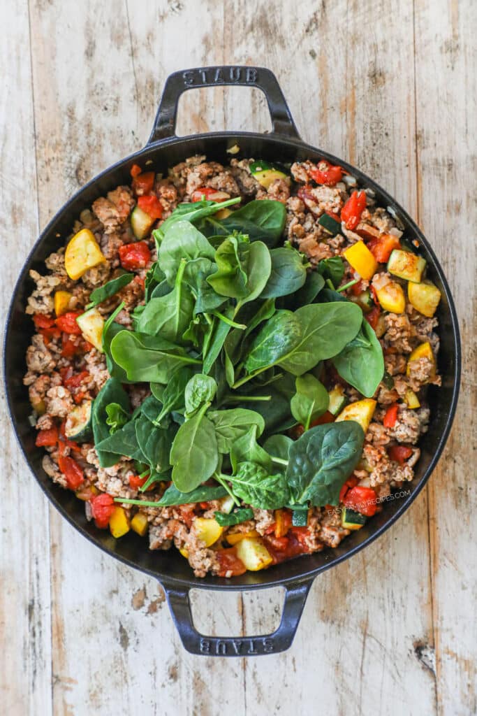 How to make Italian Ground Turkey Skillet Step 3: Stir until combined then add the fresh spinach.
