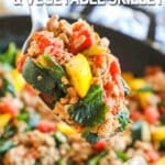 Spoonful of the Italian Ground Turkey Skillet with zucchini and tomatoes.