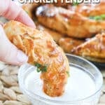 Saucy Buffalo Chicken Tenderloin being dipped in ranch dip.