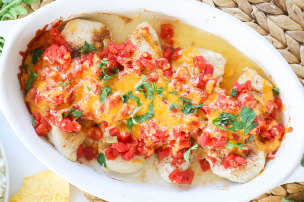 Rotel Chicken recipe baked in a casserole dish ready for an easy dinner.