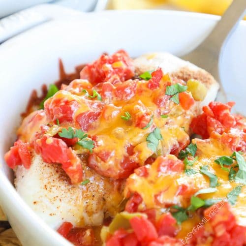 cheesy rotel chicken being served from a baking dish