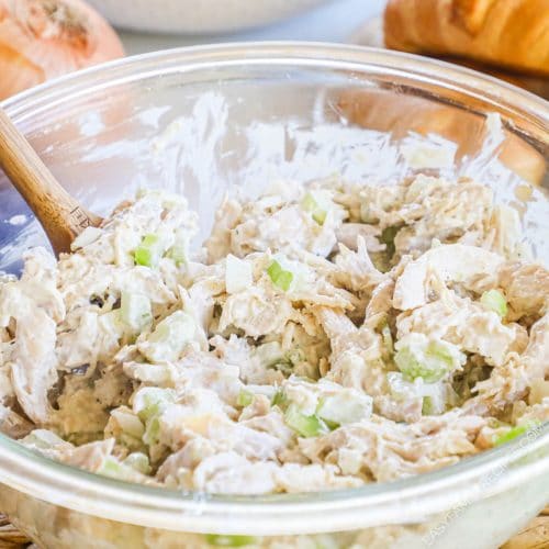 rotisserie chicken salad in a bowl with mayo, celery, and onions