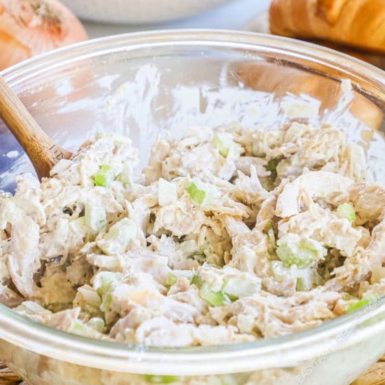 rotisserie chicken salad in a bowl with mayo, celery, and onions