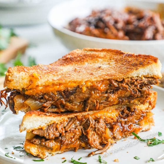 BBQ Brisket Grilled Cheese Sandwich made with Texas Toast cut in half