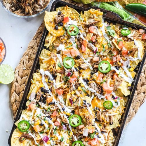 Pork Carnitas Nachos made with leftover carnitas on a sheet pan