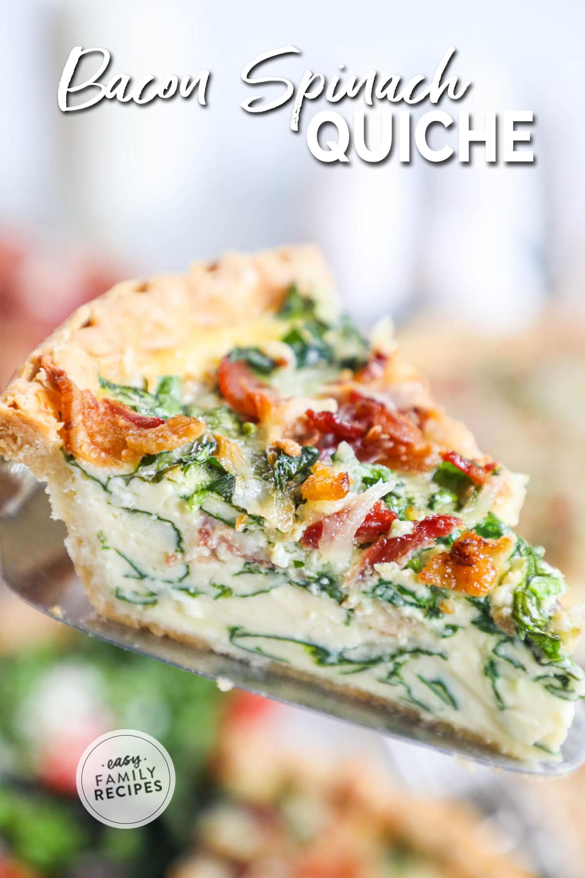 slice of deep dish spinach and bacon quiche on pie serving spatula