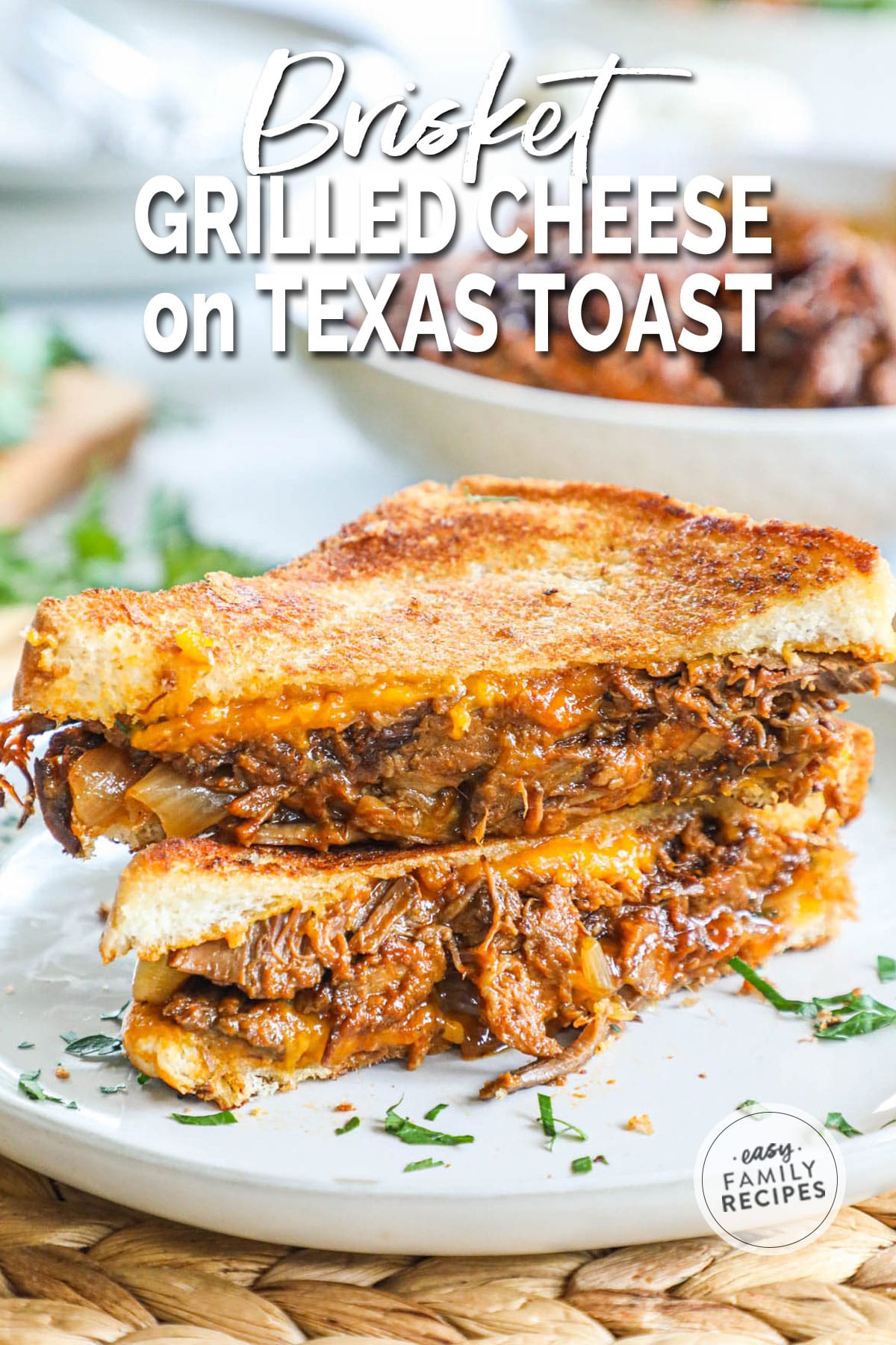 Brisket Grilled Cheese Cut in half to show cheesy beefy middle