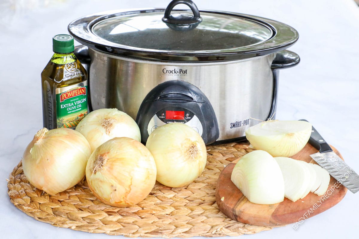 Ingredients to make Crock Pot caramelized onions including sweet onions, oil, salt and pepper