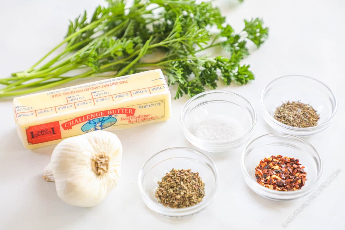 Ingredients for garlic butter with herbs.
