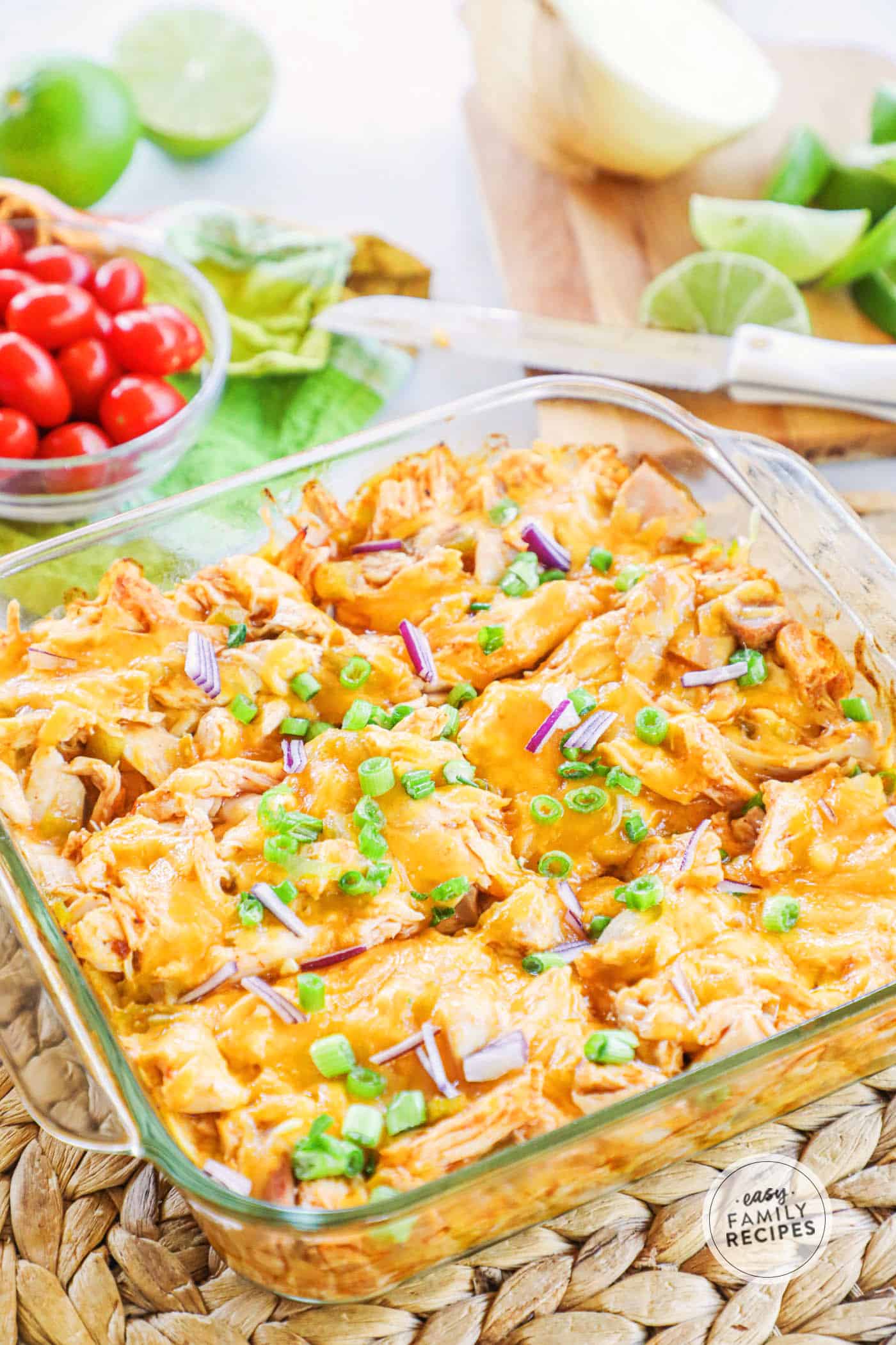 Chicken enchilada Casserole baked in a casserole dish and garnished with green onions