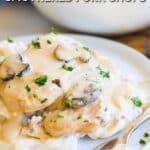 Boneless Pork Chops Smothered in Gravy made in the crockpot and served with mashed potatoes.