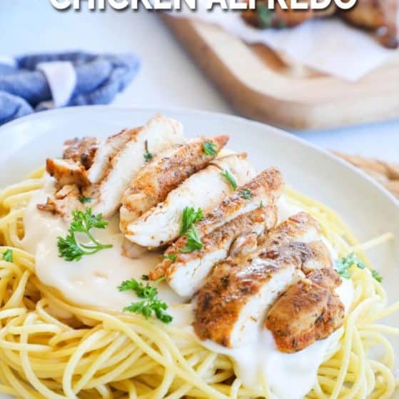 A serving of homemade blackened chicken alfredo pasta on a plate