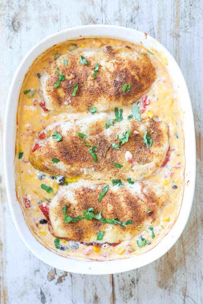 How to make Queso chicken step 4: Remove chicken stir queso to combine, then place chicken over the queso to serve.